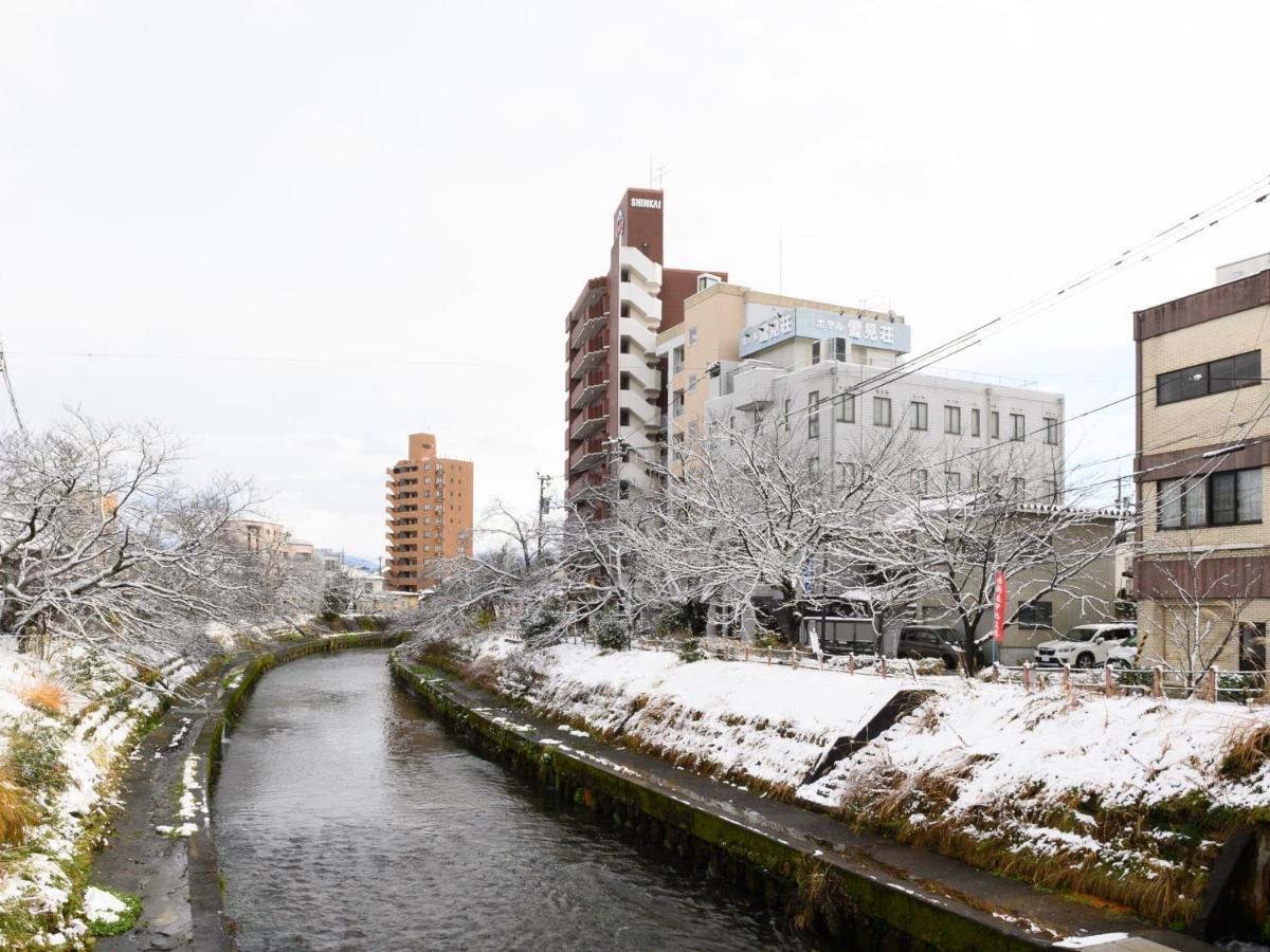 Tabist Business Ryokan Hotel Yukimiso Toyama Station Exterior foto